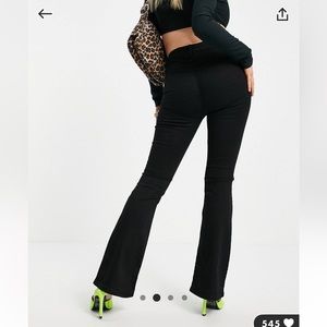 ASOS Design Petite High Rise Flare Jeans in Black